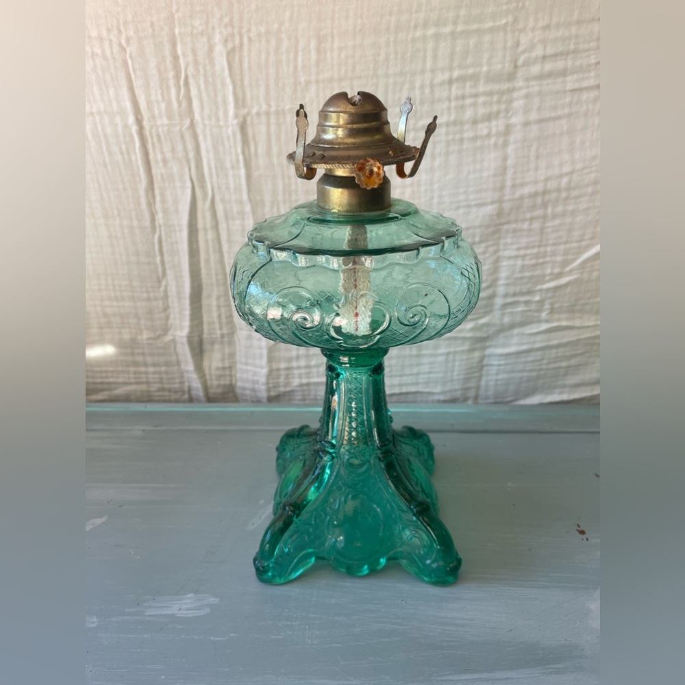 Glass oil burner
